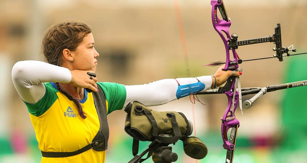 American athlete Khatuna Lorig celebrates her victory against Argentina in the women’s recurved bow event at the Lima 2019 Games at the Villa María del Triunfo Sports Center