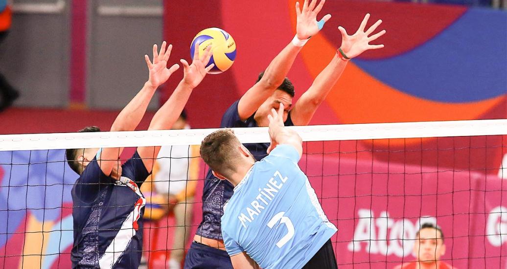 Argentinian volleyball player Jan Martínez showed his strength spiking against Peru at Lima 2019.