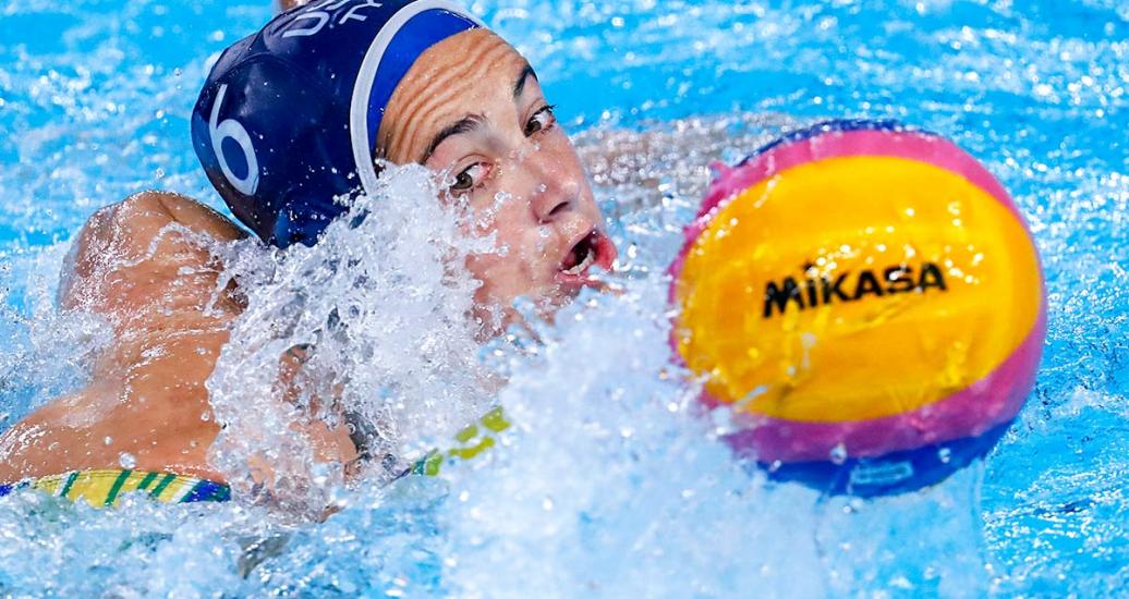 Margaret Steffens from USA fights for the ball during a women’s preliminary water polo match against Brazil 