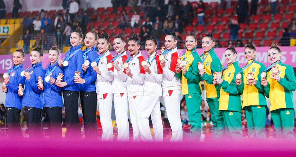 USA, Mexico and Brazil showing off their medals in rhythmic gymnastics group competition at Villa El Salvador Sports Center at the Lima 2019 Games